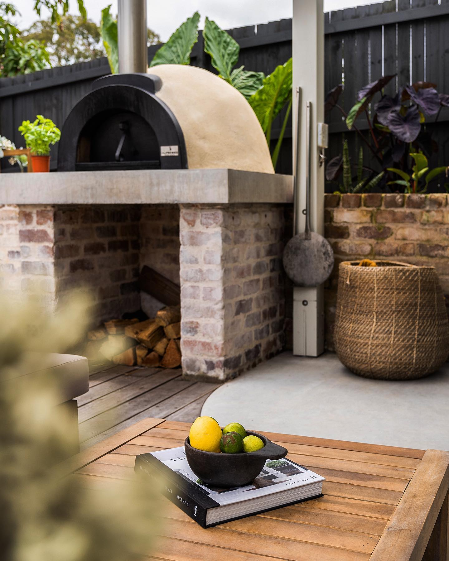Australian backyard with a built-in Alfresco Factory wood-fired oven